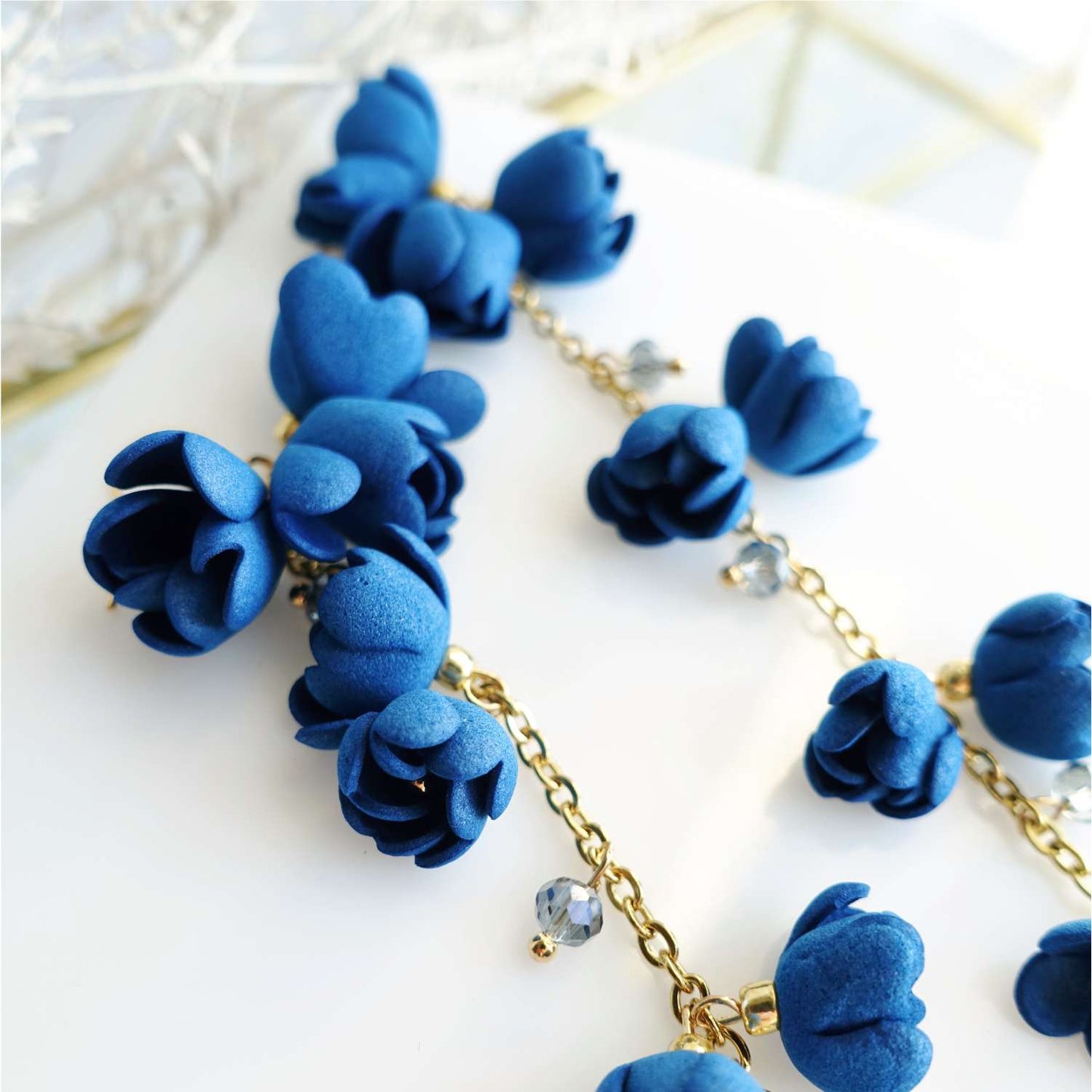 Blue flower earrings on a gold chain 867 Blue Lily of the Valley
