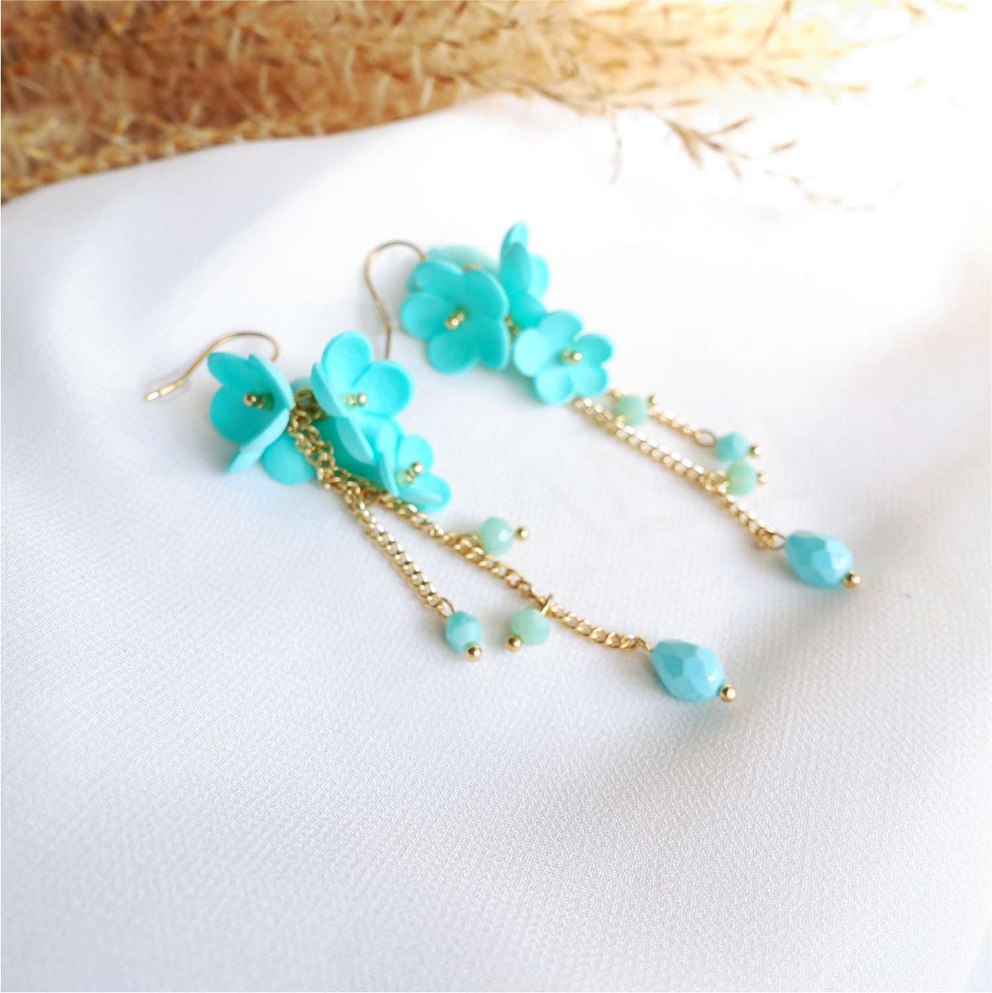 Turquoise flower earrings on a chain Turquoise Daisy DK850