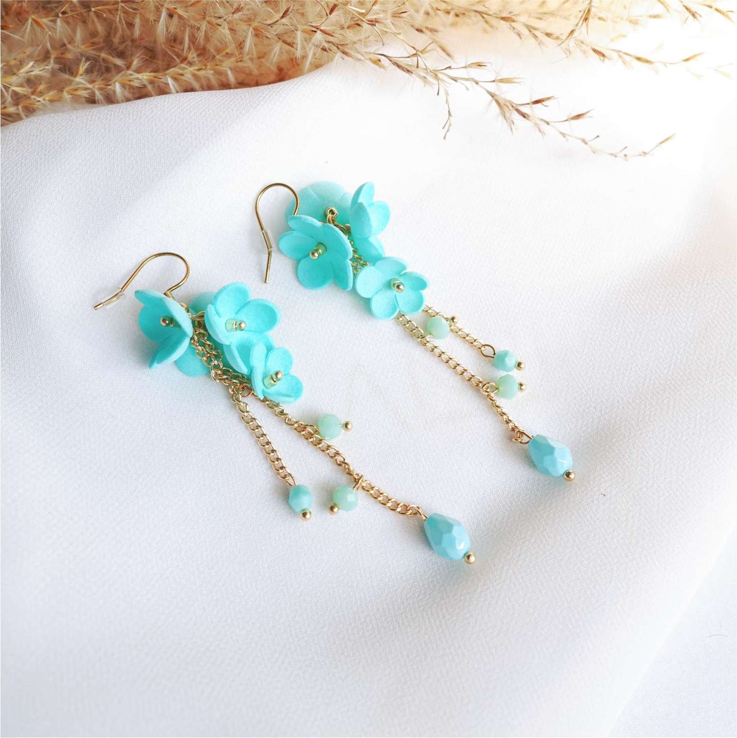 Turquoise flower earrings on a chain Turquoise Daisy DK850