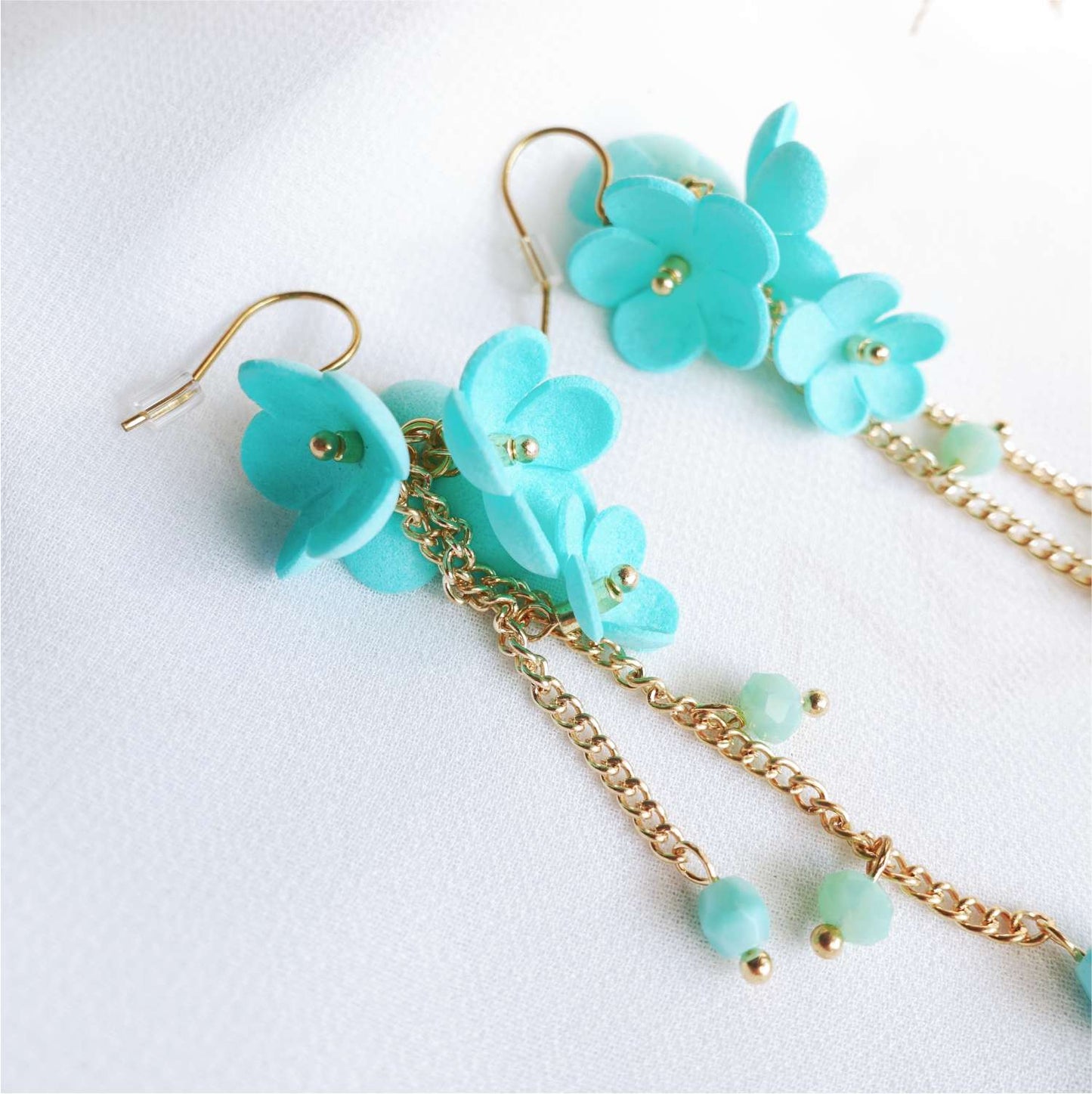 Turquoise flower earrings on a chain Turquoise Daisy DK850