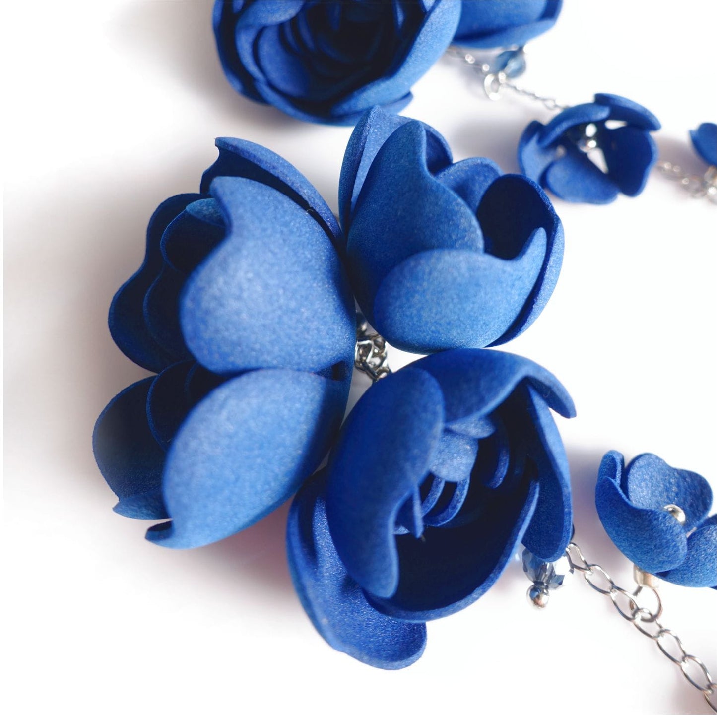 Blue flower earrings on a silver chain 855 Blue Silver Gardenia