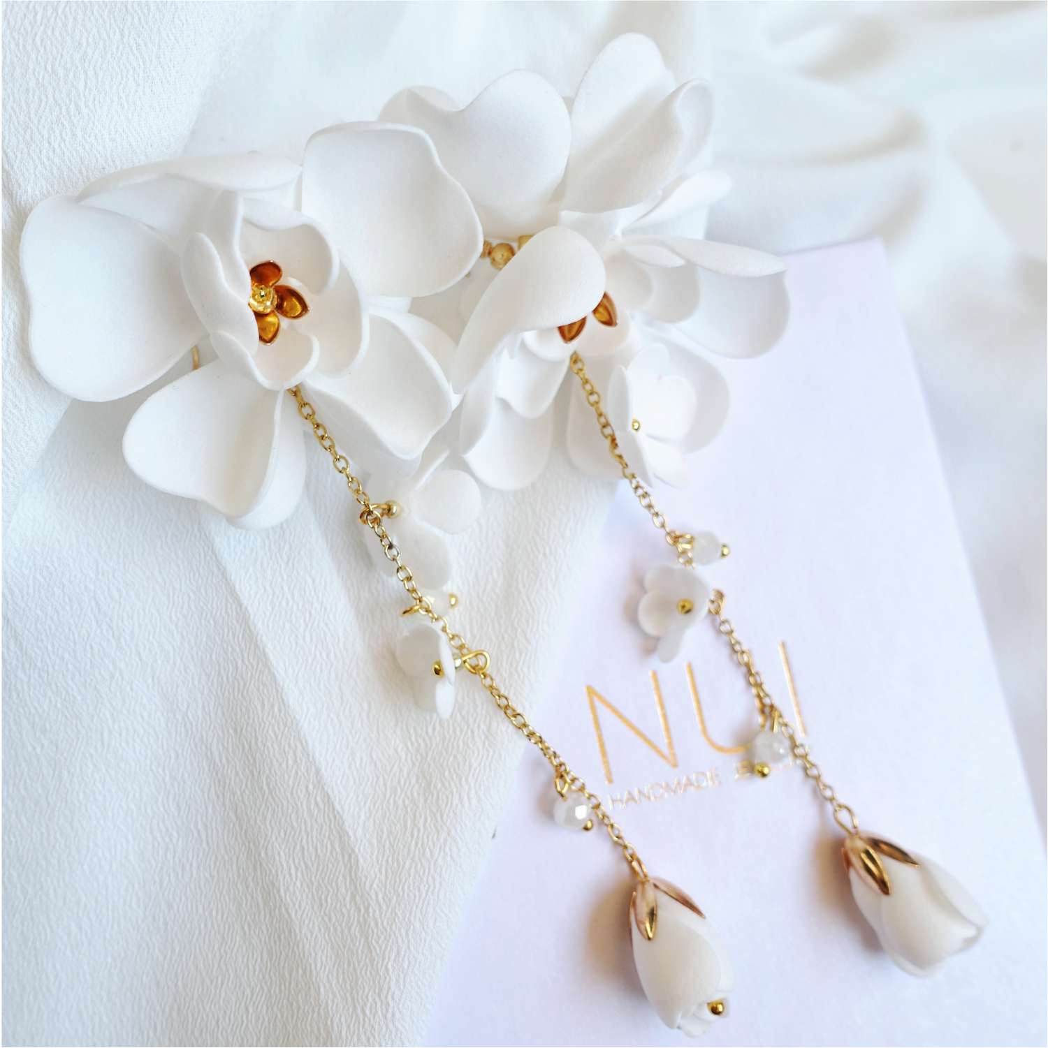 White flower earrings on a gold chain 855 White Gardenia
